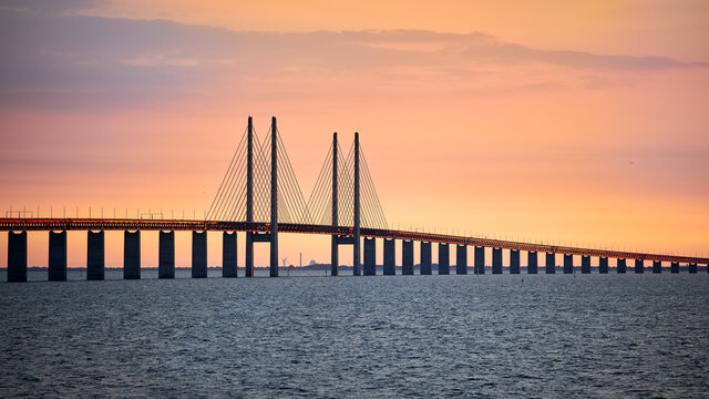 The &Ouml;resund Bridge seen from Malm&ouml; a summer evening during sunset.