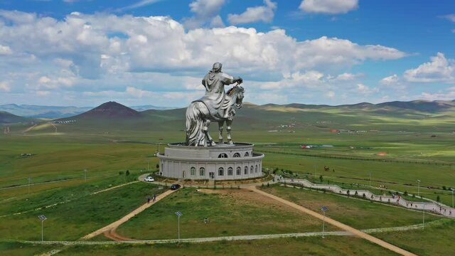 Aerial around view of huge equestrian statue of Genghis Khan in the steppe, Mongolia, Ulaanbaatar, 4k