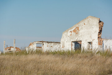 Abandoned buildings. Brick old houses. Ruined houses. Abandoned villages. Rural landscapes. The architecture of the old village.