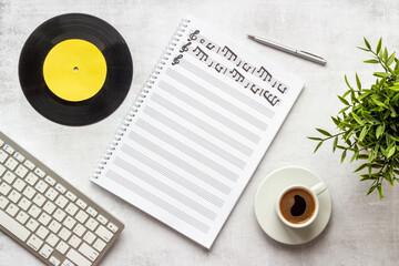 Music sheets with musical notes melody and vinyl record