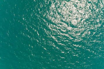 Sea surface aerial view,Bird eye view photo of waves and water surface texture Green sea background Beautiful nature Amazing view