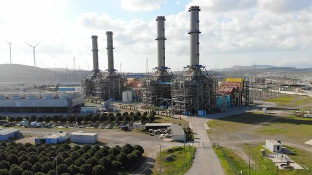 refinery and oil tank. Business and petrochemical plants, beautiful aerial view large powerful gas and oil refinery industrial complex with pipelines and chimneys against sky