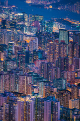 Nightscape of the residential area of downtown Kowloon, Hong Kong. cyberpunk color tone