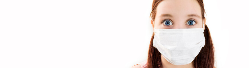 Portrait of a girl in a medical mask close-up on her face expresses emotions of surprise or fear. Isolated over white background. children wearing medical masks for protection.