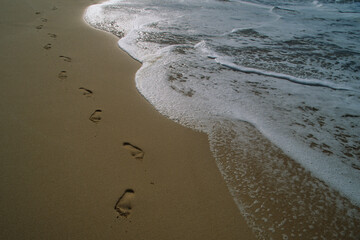 Footprints in the sand in Maui Hawaii
