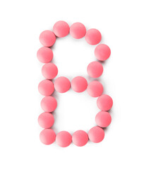 Vitamin B pills on white background