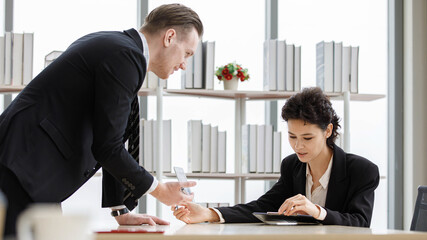 Businesspeople working on new project together