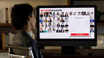 Businesswoman registering on online dating website