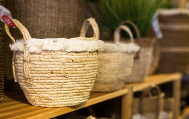 Obraz premium Wicker baskets for linen on hardware store shelves