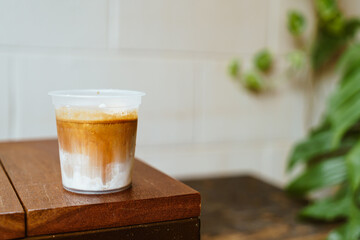 dirty coffee in takeaway glass