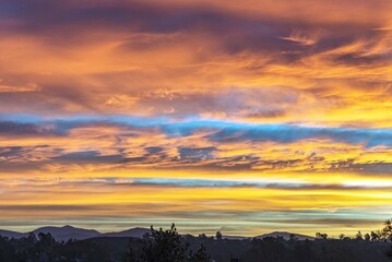 Clouds Racing at Sunrise