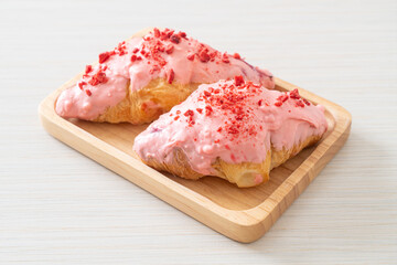 croissant with strawberry chocolate sauce