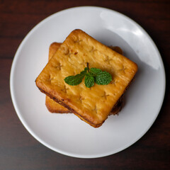 Tape Kabin, Indonesian Typical Food, made from cracker or biscuit and combine with tape