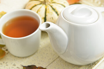 Obraz na płótnie Canvas Tray with tea pot on table, closeup