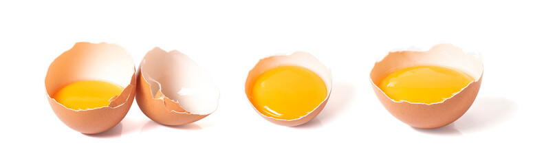 half broken egg and yolk isolated on white background with clipping path. - obrazy, fototapety, plakaty