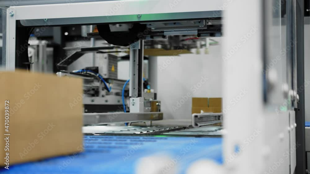 Poster streamlined assembly line by use of automated packaging machinery