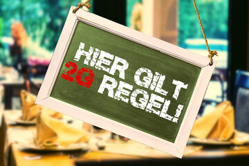 Ein Restaurant und Hinweis auf 2G Regel