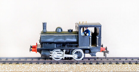 Steam locomotive model, Steam locomotive model and a train track cut out