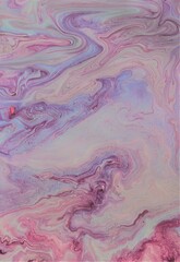 Abstract background of lilac marble. Multicolored spots of acrylic paint, freely flowing and creating an interesting pattern. Bright color. Background for the cover of a book, laptop.