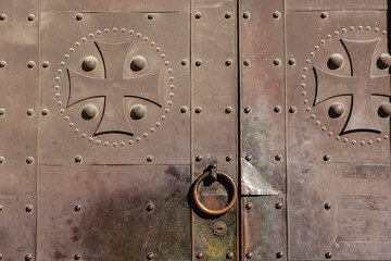 Door knocker on ancient metal door in Tbilisi, Georgia