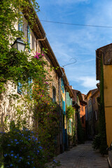Historic old alley in the Provencal village Grimaud, Provence, France