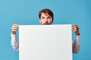 emotional man White mockup poster in hand advertising isolated background