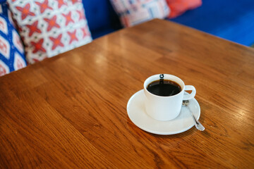 A cup of coffee on the table