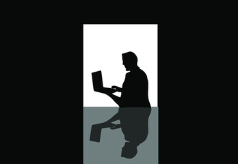 silhouette of a person with a laptop