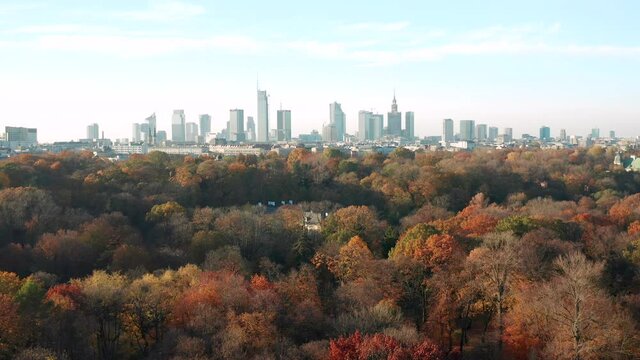Horizon skyline of warsaw city during autumn from lazienky park view