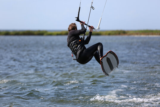 A kitesurfer in action at Tofta Beach, Gotland Sweden.