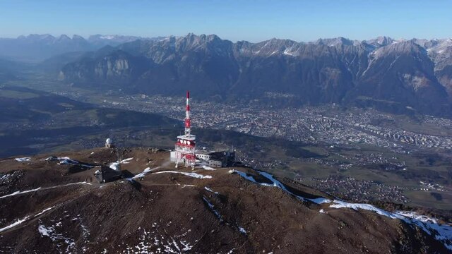 Aerial View Of Patscherkofel In Tyrol, South Of Innsbruck In Austria With Transmission Tower On Mountain Top.
