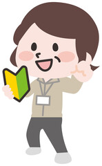 初心者マークを持つシニア店員さん