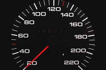 Speedometer in a car. Car dashboard. Dashboard details with indication lamps.Car instrument panel. Dashboard with speedometerCar detailing. Modern interior.Closeup.Copy space.