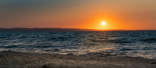 Beautiful sunset on the German Baltic Sea coast at Weissenhauser Strand