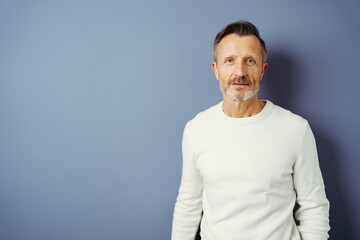Concerned man looking at camera with anxious look