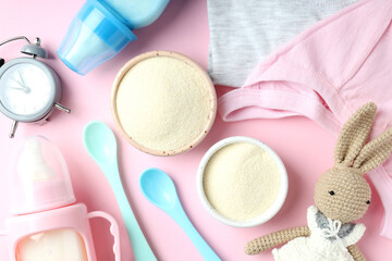 Concept of baby food with рowdered milk on pink background
