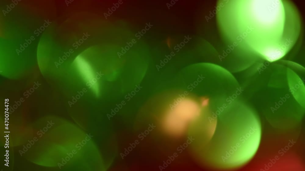 Canvas Prints shimmering green and red christmas bokeh. smooth movements and play of round festive bokeh with ligh