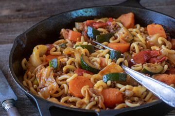 Pasta with ground beef, vegetable and cabbage