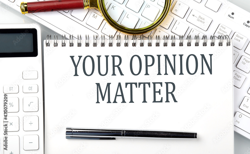 Poster your opinion matter text on notepad with calculator and keyboard,business concept