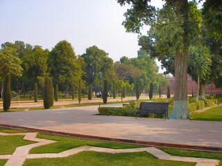 Tourists and locals visiting Taj Mahal in Agra and walking around the area. Landmark Taj Mahal.