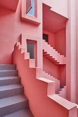 Picturesque geometric building in pink tone. Calpe, Alicante