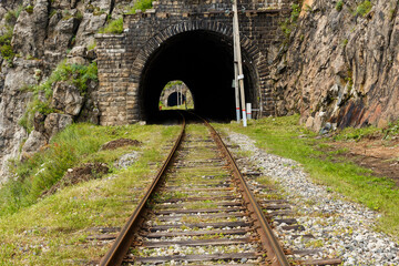 Fototapeta na wymiar Circum-Baikal Railway. Old railroad tunnel number 25 on the railway. tunnel Pillars 1