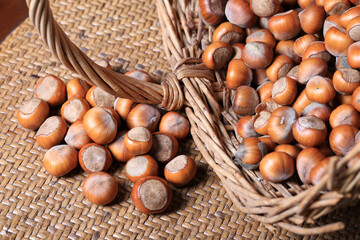 Hazelnuts in a wicker basket close-up