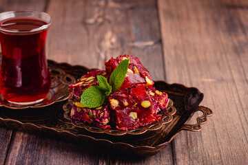 Traditional Turkish Delight with glass of tea