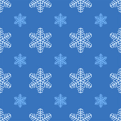 Christmas seamless pattern. White and blue colored snowflakes icons on dark blue background. Christmas texture