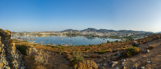Fototapeta na wymiar Panorama at dawn on the bay of the city of Gumbet near Bodrum, Turkey.