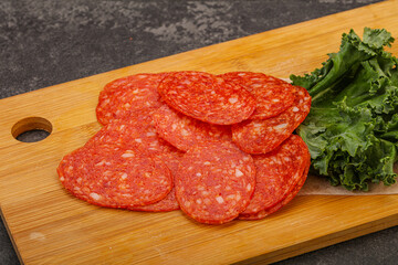 Italian spycy pepperoni sausage slices