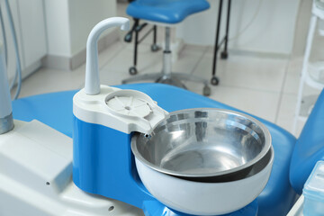 Clean spit sink in modern dentist's office