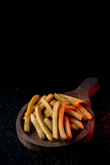 French Fries on a wooden plate, photography