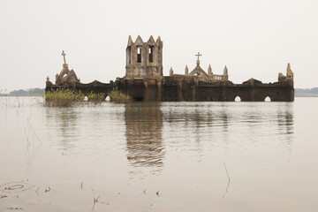 The Rosary Catholic church built by the French in 1860s in Shetti halli is seen submerged in the...